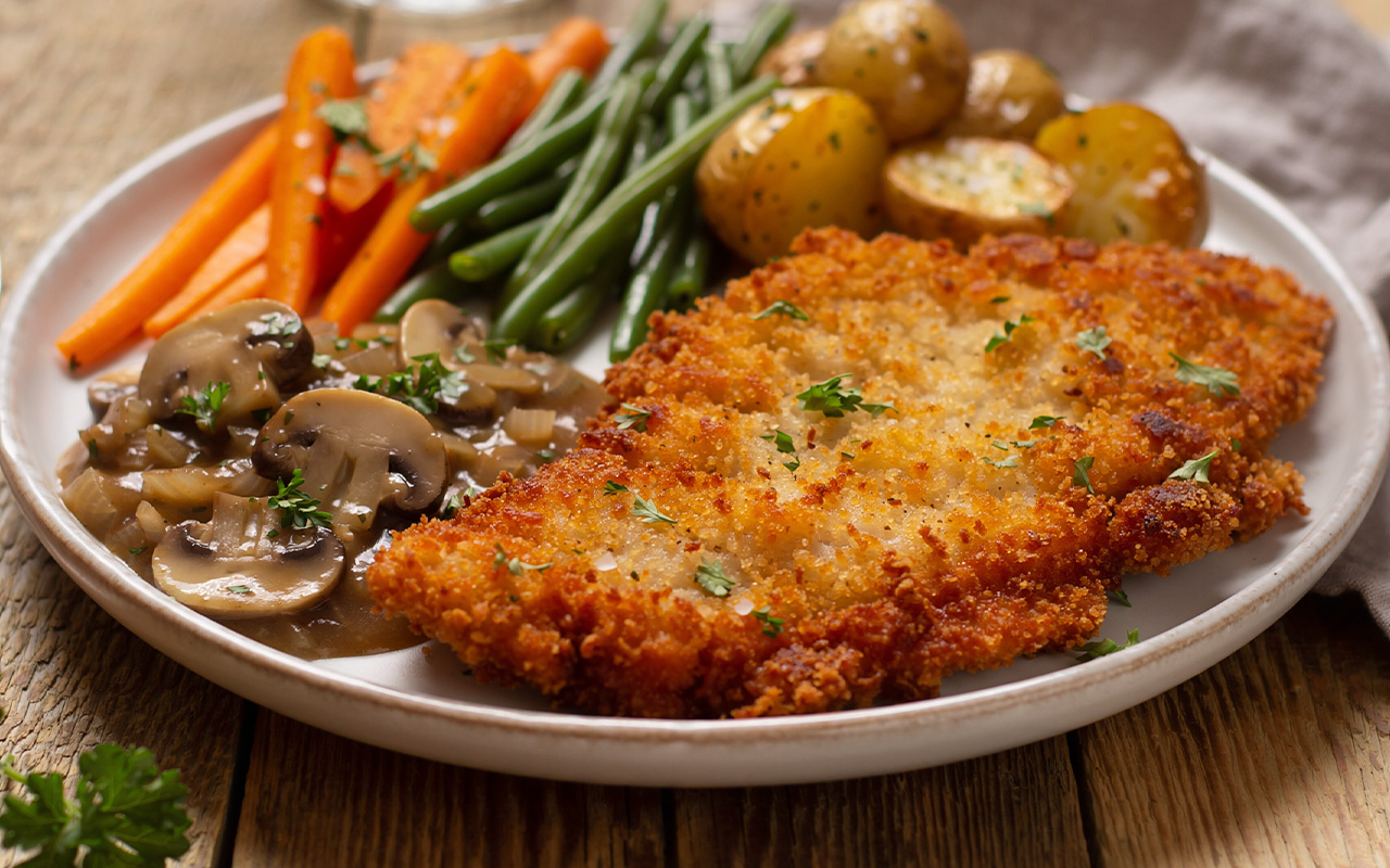 Putenschnitzel mit Jägersauce + Bratkartoffeln